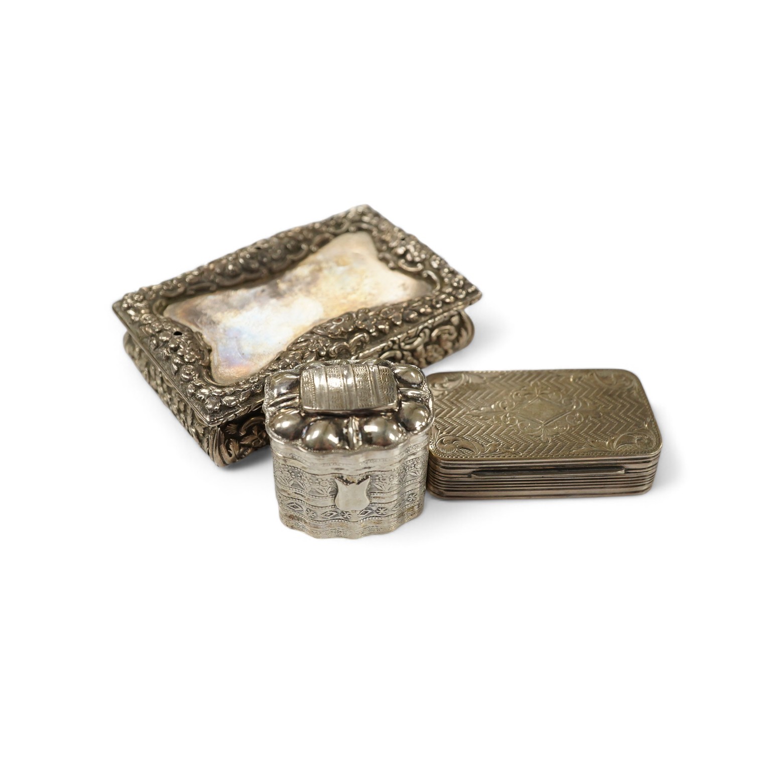 A George IV silver snuff box, by Nathaniel Mills (a.f.), Birmingham, 1827, 84mm, a Dutch white metal pill box and a Portuguese white metal snuff box. Condition - poor to fair